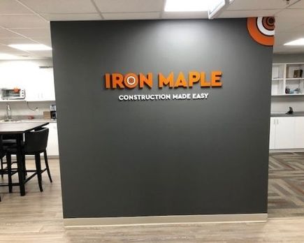 Iron maple construction made easy sign installed on a wall 
