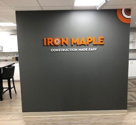 Iron maple construction made easy sign installed on a wall 