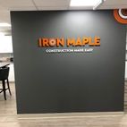 Iron maple construction made easy sign installed on a wall 