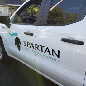 spartan sticker on car door