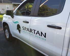 spartan sticker on car door